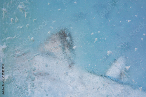 Fototapeta Naklejka Na Ścianę i Meble -  Abstract frozen water.Ice texture winter background