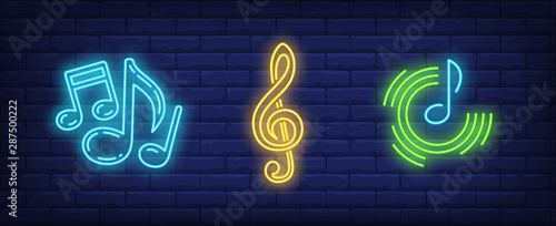 Music notes and treble clef neon signs set