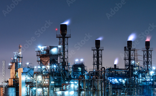 Industrial view oil and gas refinery,Detail of equipment oil pipeline steel at night background photo