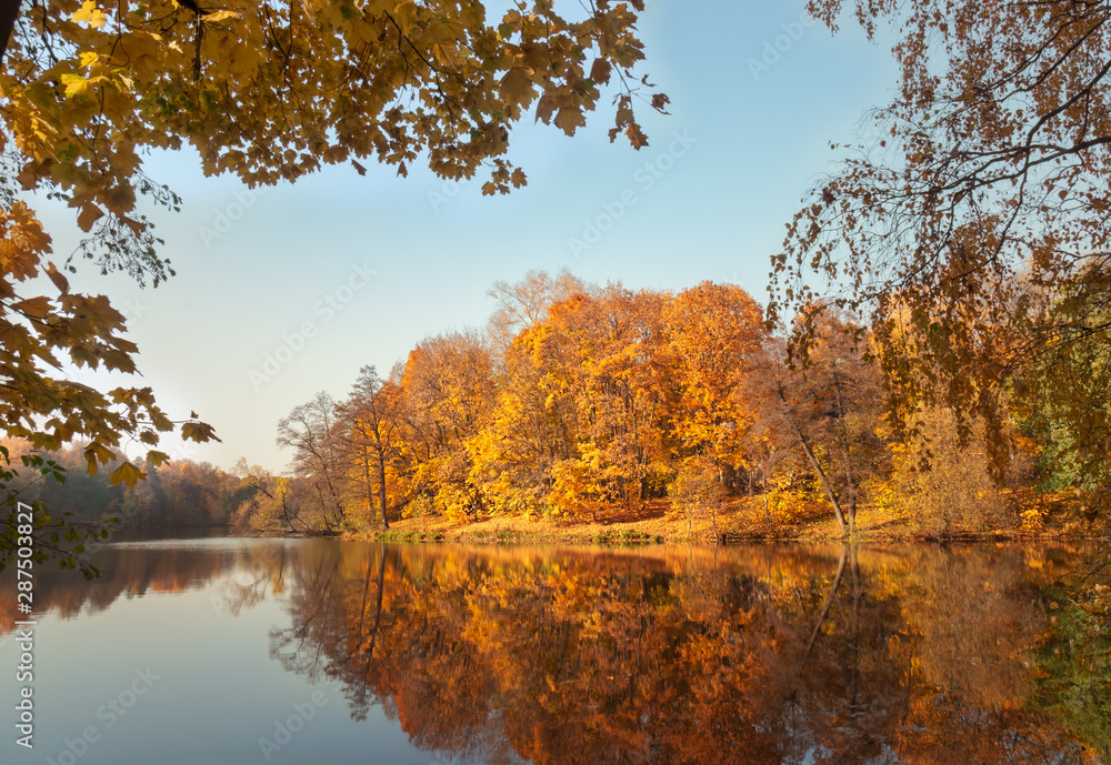 Lake in autumn forest. Beautiful nature landscape. Selective focus. Lake in autumn forest. Beautiful nature landscape. Selective focus.