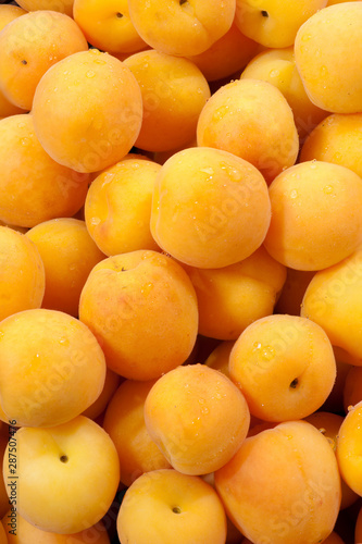 A bunch of fresh apricot in a market