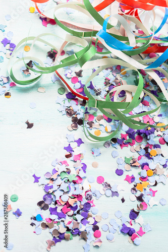 Colorful party background with confetti.
