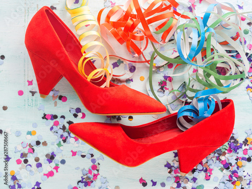 Red pumps. Party or sale concept
