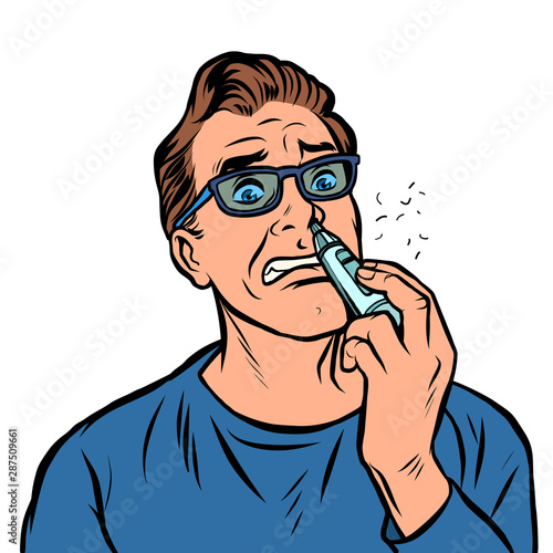a man shaves the hair in the nose