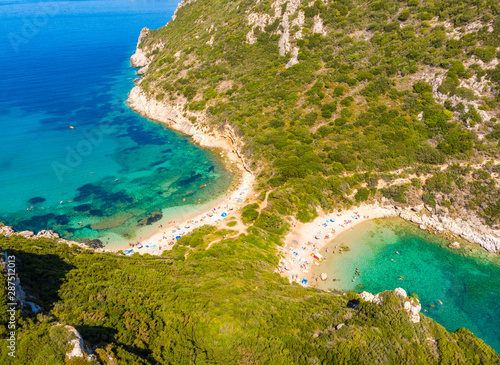 Aerial view of Porto Timoni beach at Afionas is a paradise double beach with crystal clear azure water in Corfu, Ionian island, Greece, Europe