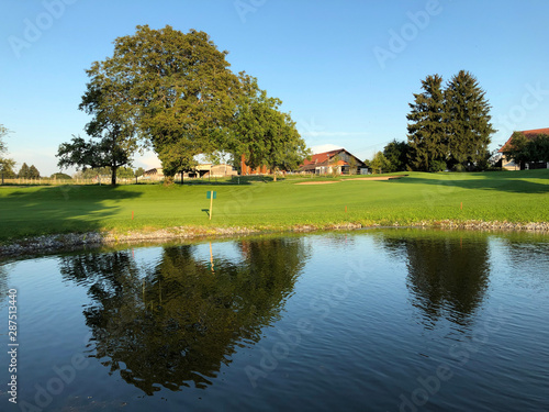 Small lake on golf course Breitenloo or Seeli am Golfplatz Breitenloo, Oberwil bei Nürensdorf - Canton of Zurich, Switzerland photo