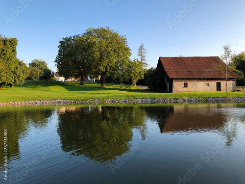 Small lake on golf course Breitenloo or Seeli am Golfplatz Breitenloo, Oberwil bei Nürensdorf - Canton of Zurich, Switzerland photo