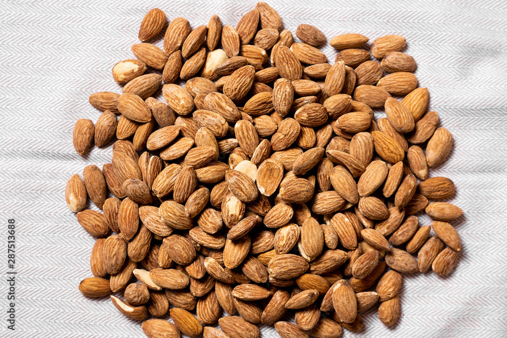 Mount of almonds on table cloth Mount of almonds on table cloth