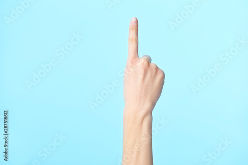 human hand showing number one