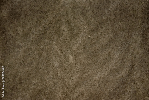 Onde sulla sabbia in spiaggia d'estate