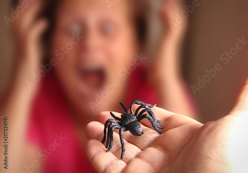 Spider in a hand, Arachnophobia