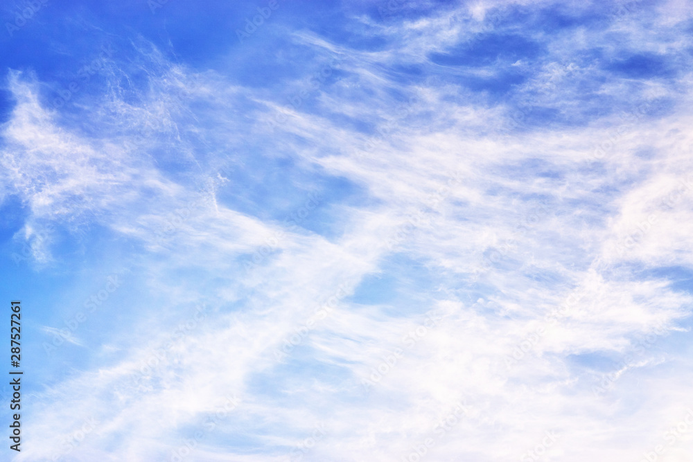 White clouds strokes on a blue background.