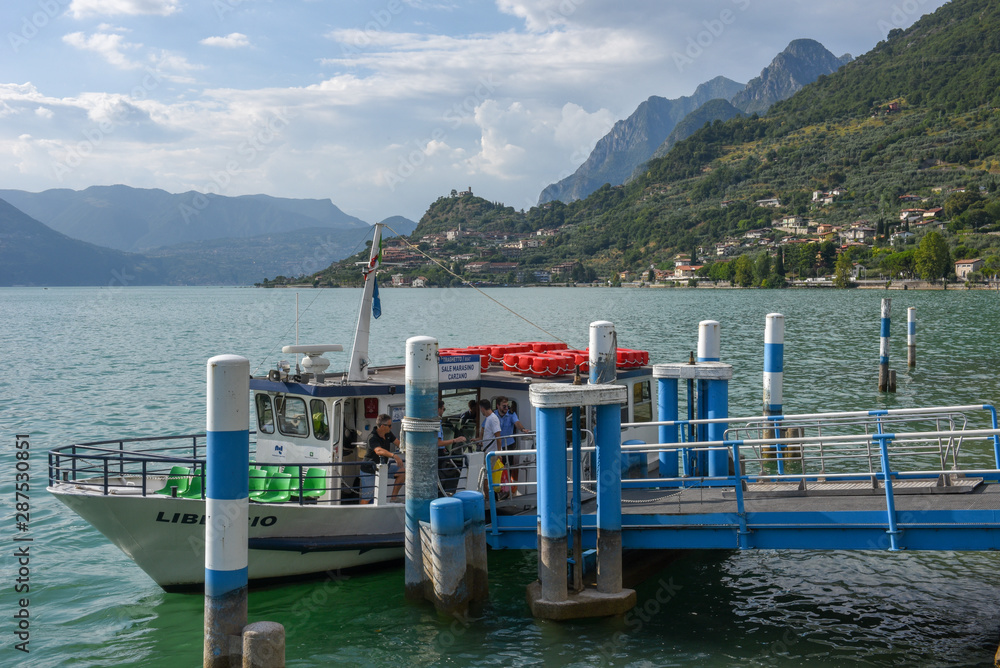 Touristic boat at Sale Marasino on Iseo Lake in Italy