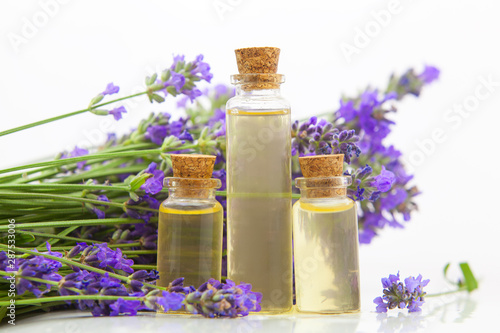 lavender essential oil in  beautiful bottle on White background