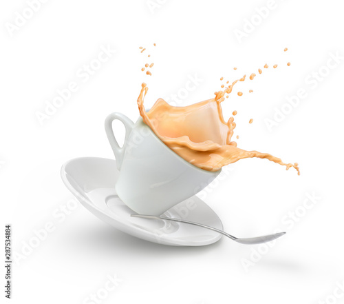 milk coffee splash in white cup isolated