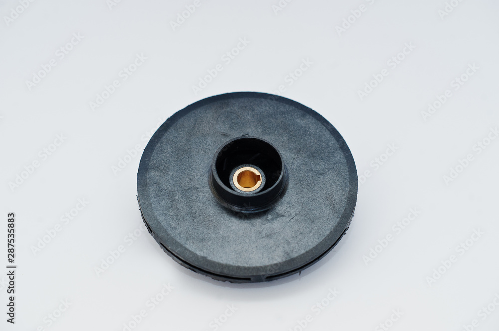 Spare part round disc for water pump isolated on white. Spare part round disc for water pump isolated on white.