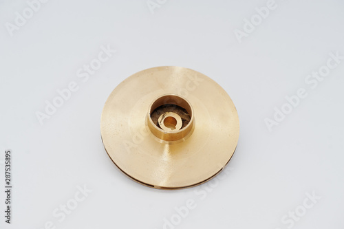 Spare part round disc for water pump isolated on white.