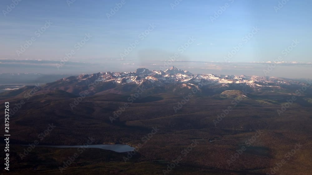 AERIAL of Snow Capped Mountain Ranges of Grand Teton National Park, USA AERIAL of Snow Capped Mountain Ranges of Grand Teton National Park, USA