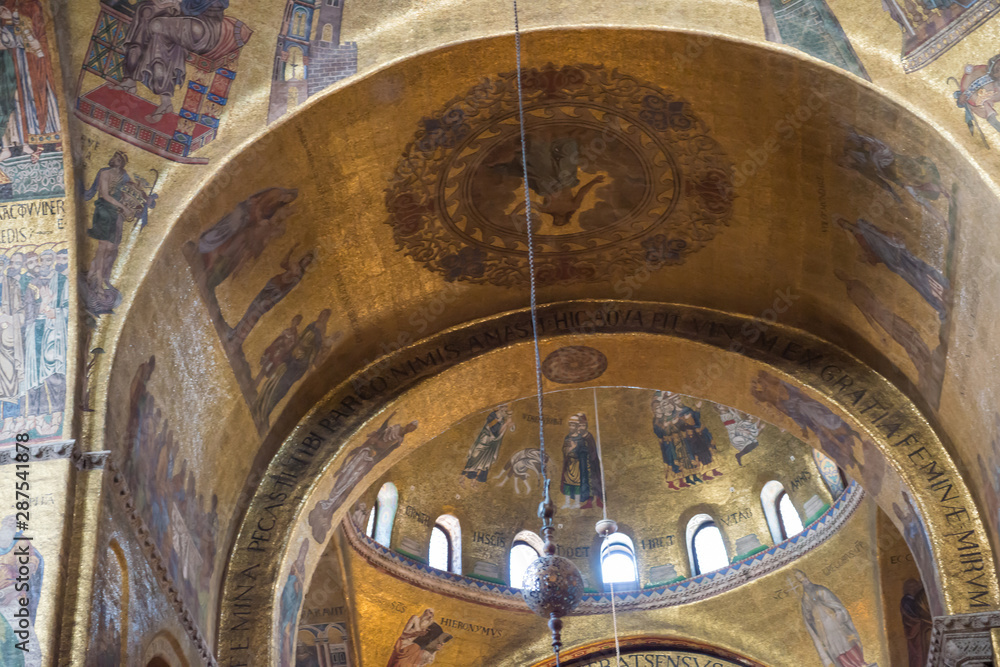Luxury interior of Saint Mark's Basilica with gold and lots of mosaics. Venice, Italy