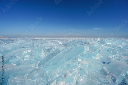 glow blue beautiful ice crystal sheets in Baikal lake during winter season