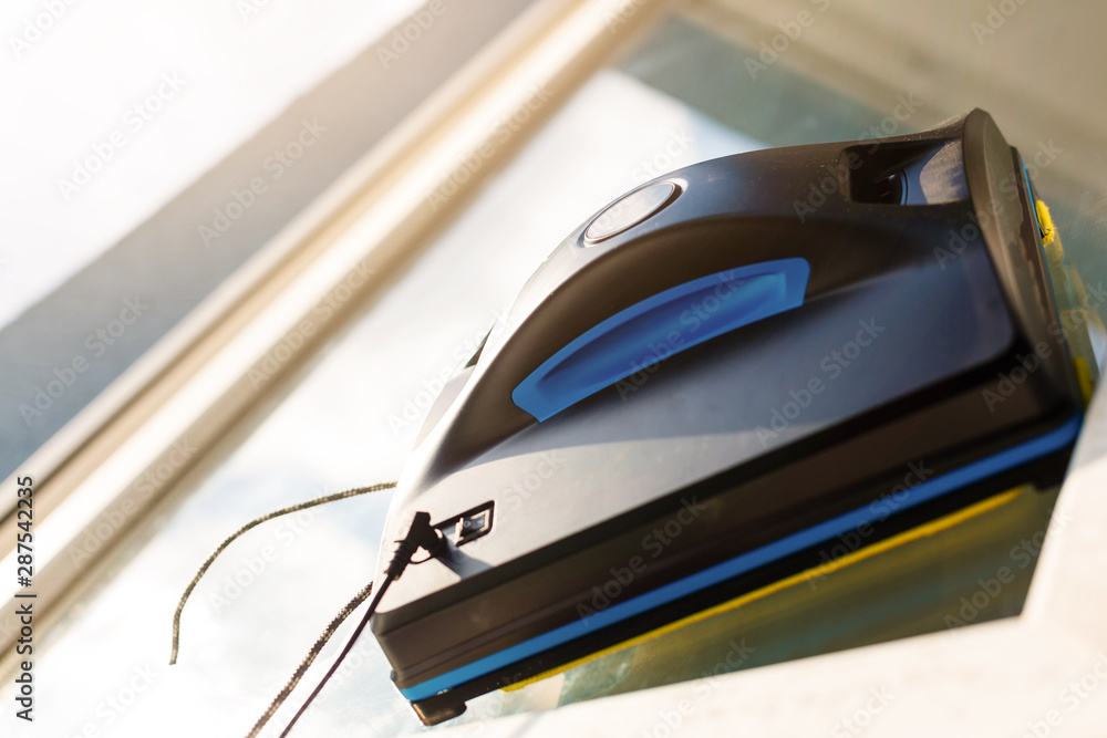 window cleaning robot at work background image with space for text window cleaning robot at work background image with space for text