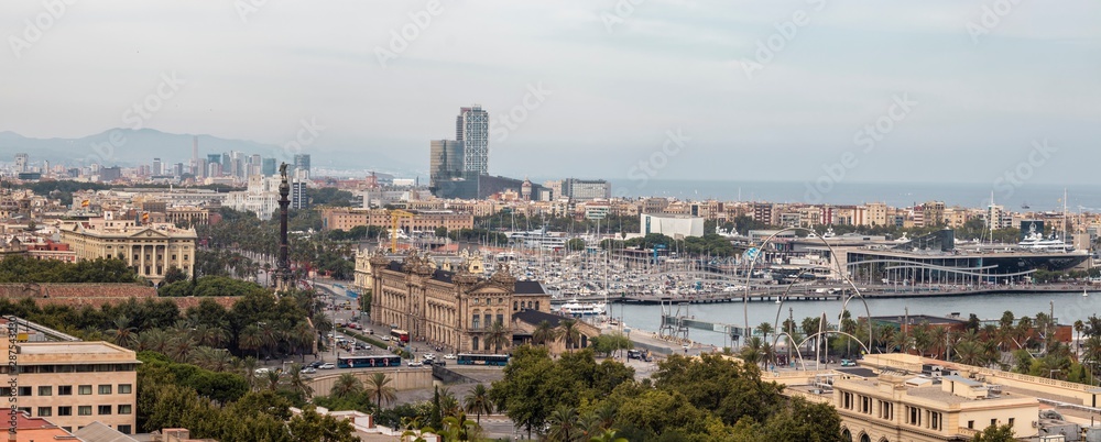 Panoramic image of Barcelona Port Vell and Drassanes square with Columbus statue
