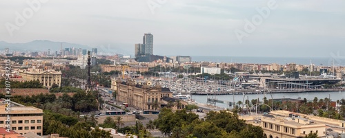 Panoramic image of Barcelona Port Vell and Drassanes square with Columbus statue photo
