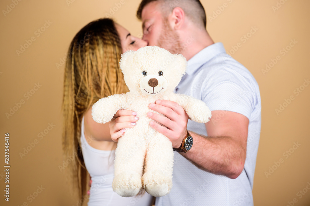 Loving relationship. man and woman embrace. couple in love. family relations and happiness. valentines day present. sexy girl and man hold teddy bear. romantic relationship. love date. family values Loving relationship. man and woman embrace. couple in love. family relations and happiness. valentines day present. sexy girl and man hold teddy bear. romantic relationship. love date. family values