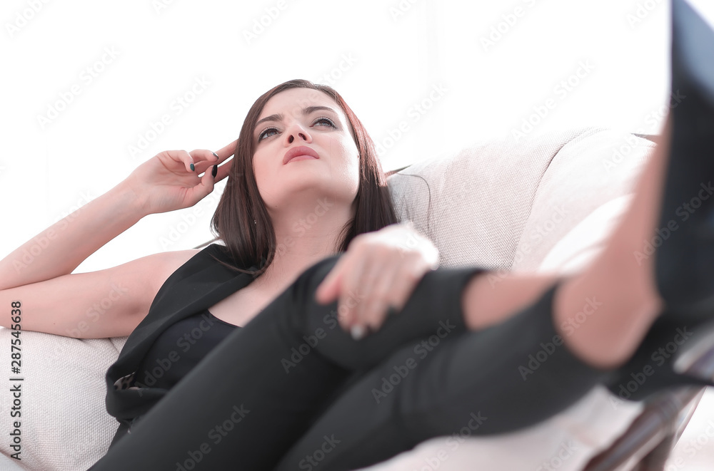 elegant business woman sitting in a comfortable chair. elegant business woman sitting in a comfortable chair.