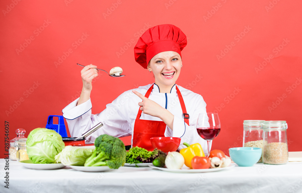 Cooking meal. Professional cooking tips. Woman chef try taste eat food. Delicious recipe concept. Girl at kitchen table. Cooking food and housekeeping. Housewife routine. Cooking healthy food Cooking meal. Professional cooking tips. Woman chef try taste eat food. Delicious recipe concept. Girl at kitchen table. Cooking food and housekeeping. Housewife routine. Cooking healthy food