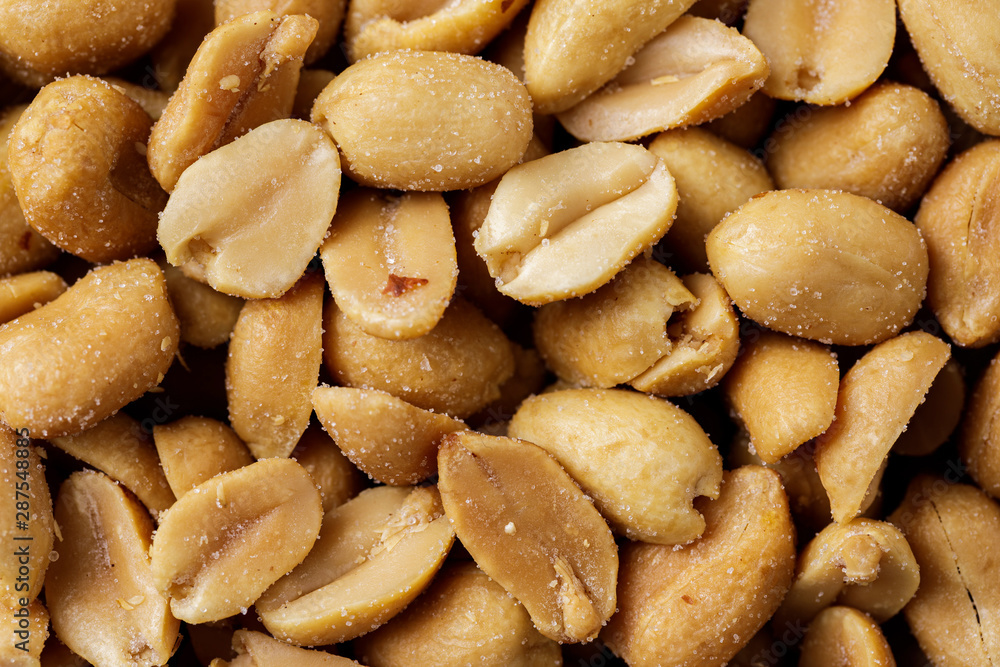 the peanuts texture. Nuts. salted peanuts background. the peanuts texture. Nuts. salted peanuts background.