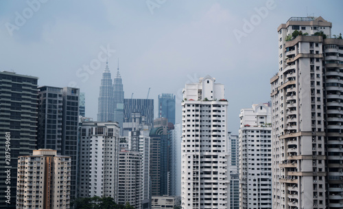 Aerial panorama of Kuala Lumpur city skyline during cloudy day  Malaysia