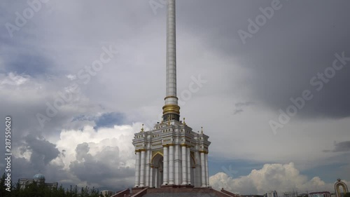 Dushanbe Independence Monument Breathtaking Picturesque Side View on a Cloudy Rainy Day photo