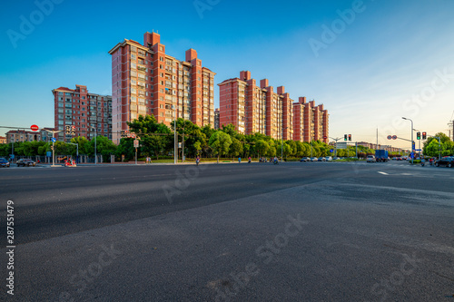 Real estate and residential buildings on the side of the road © Weiming