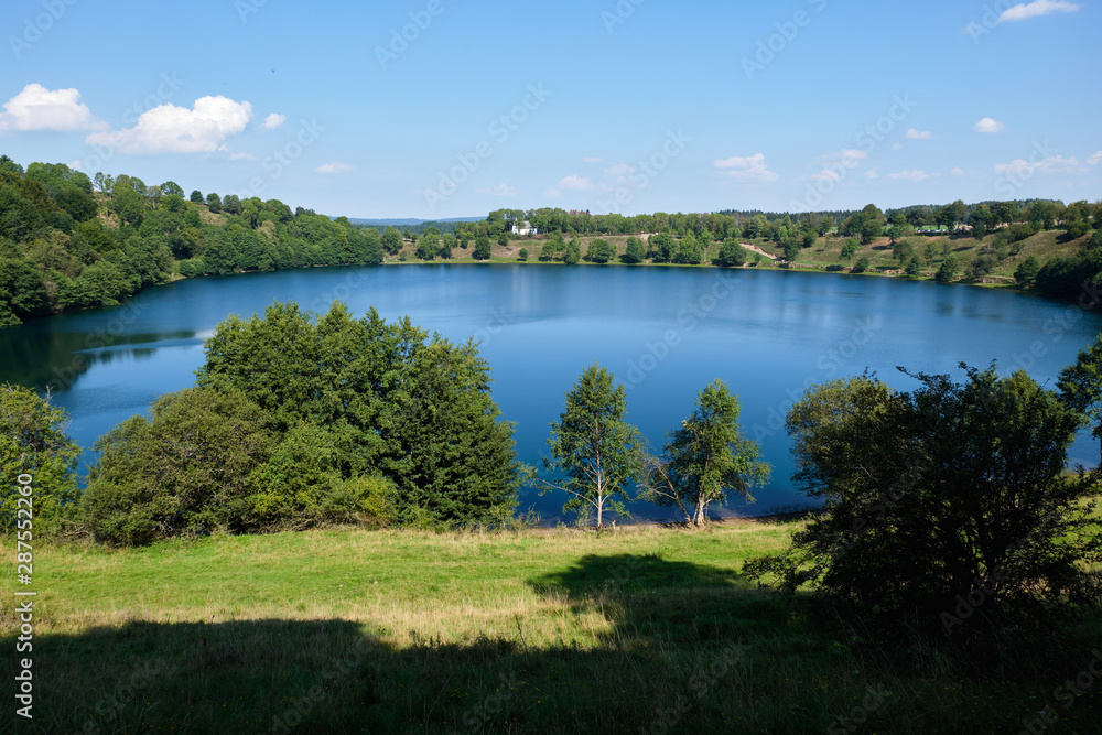 Landscape with maar in volcanic eifel in Germany Landscape with maar in volcanic eifel in Germany