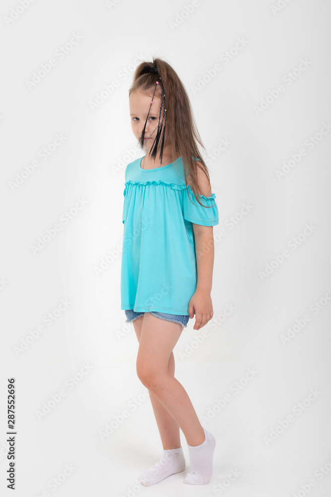 Thoughtful little girl six years old daughter look away on copy space thinking isolated on grey beige background, funny kid pout lips hold finger near mouth conceived some kind of prank, concept image Thoughtful little girl six years old daughter look away on copy space thinking isolated on grey beige background, funny kid pout lips hold finger near mouth conceived some kind of prank, concept image