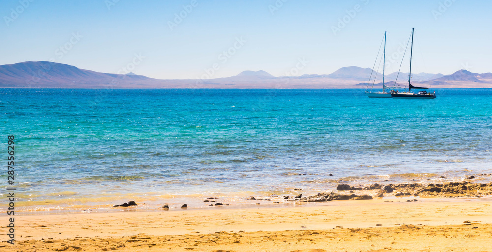 paradise beach at La Graciosa Island with view on Lanzarote, Canary Islands, Spain