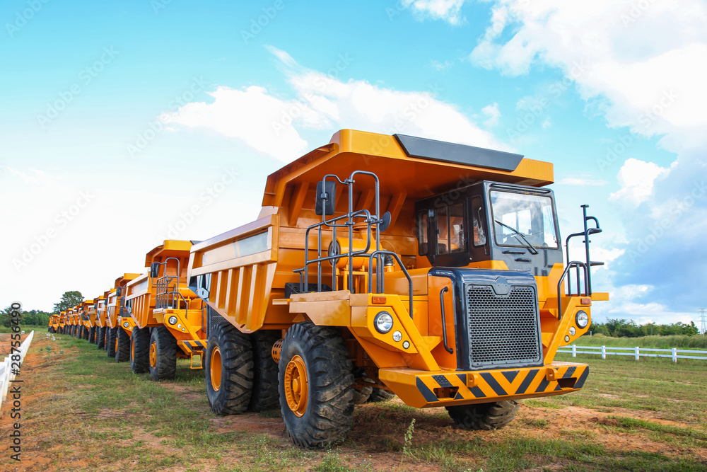 Fototapeta premium Yellow mining trucks