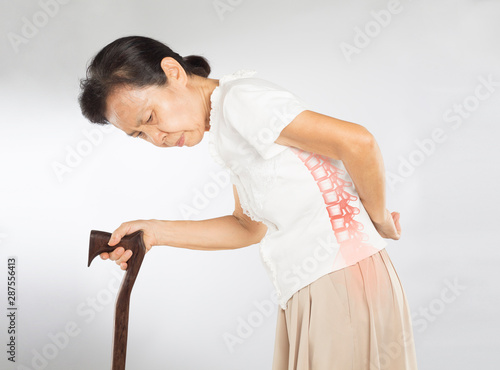 old asian woman feel spine bones pain