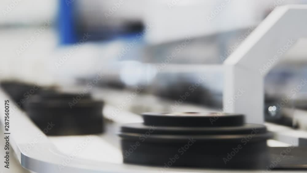 Belt conveyor system carrying compact products 4K UH clog footage Belt conveyor system carrying compact products 4K UH clog footage