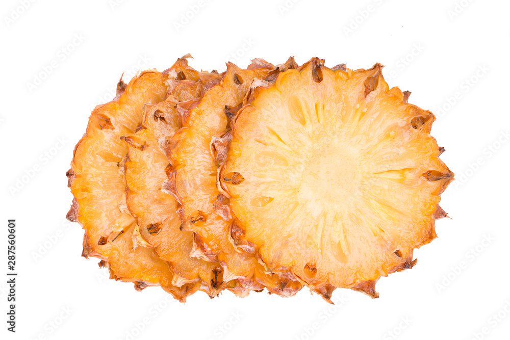 Pineapple close-up. Sliced pieces of juicy pineapple on a white background. Pineapple close-up. Sliced pieces of juicy pineapple on a white background.