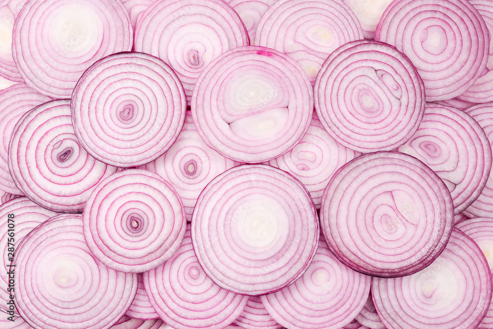 Onion slices as a background. Top view. Onion slices as a background. Top view.