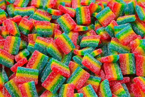 Rainbow juicy gummy candies background. Top view. Jelly sweets.