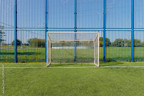 soccer empty gate on green grass field