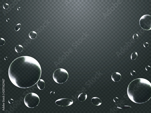 Abstract water drops or liquid bubbles decorated on black transparent background. photo