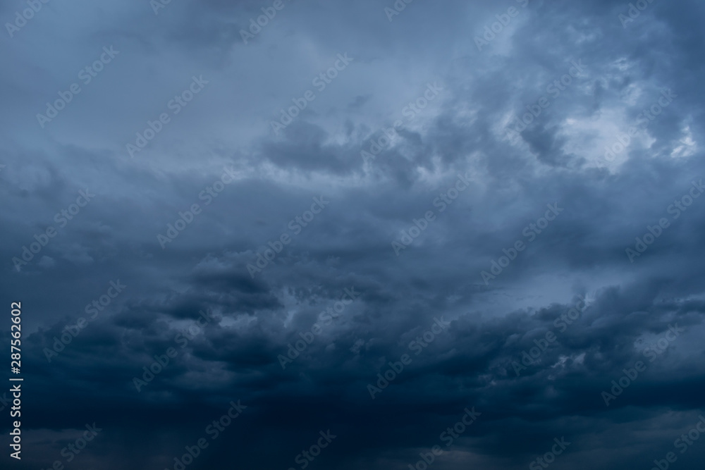 Dramatic stormy dark cloudy sky, natural photo background