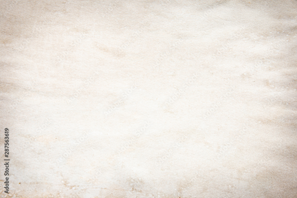 Old brown and white paper stained with coffee. Vintage abstract background. Old brown and white paper stained with coffee. Vintage abstract background.
