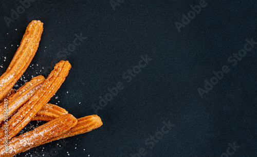 Fotografia Churro on a black background