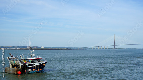 French fishing trawler goes to sea to fish.