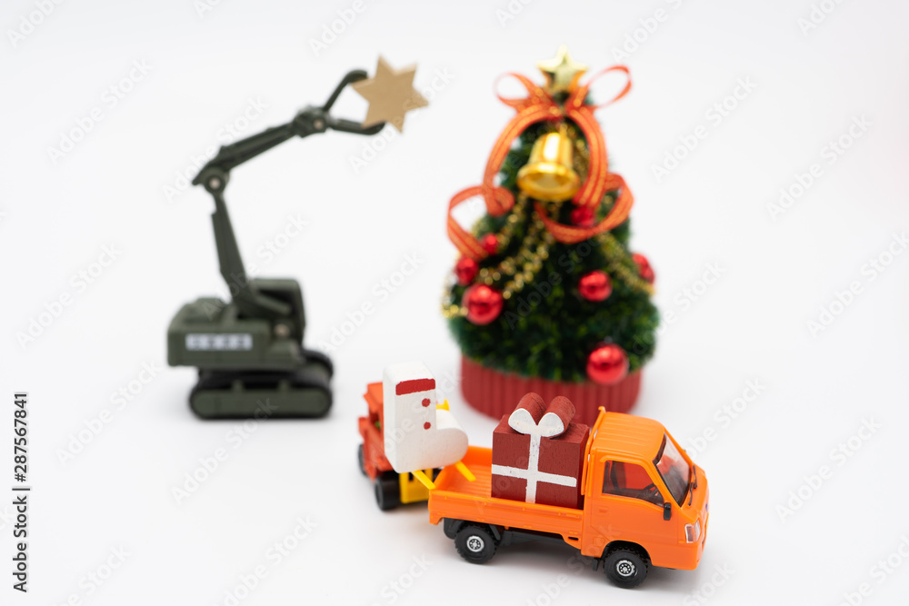 Obraz premium Miniature Christmas tree Celebrate Christmas on December 25 every year. using as background xmas concept with copy spaces for you